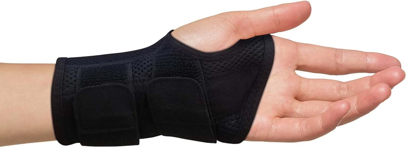 A person wearing a collar or brace on their left hand due to pain or injury.